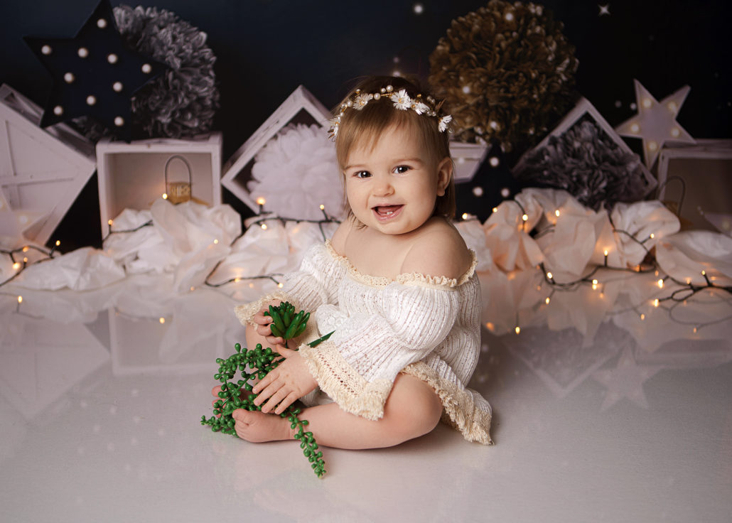 cake smash sitter session baby girl stars backdrop maddy rogers