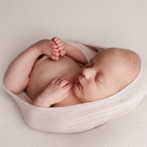 egg wrap newborn curled